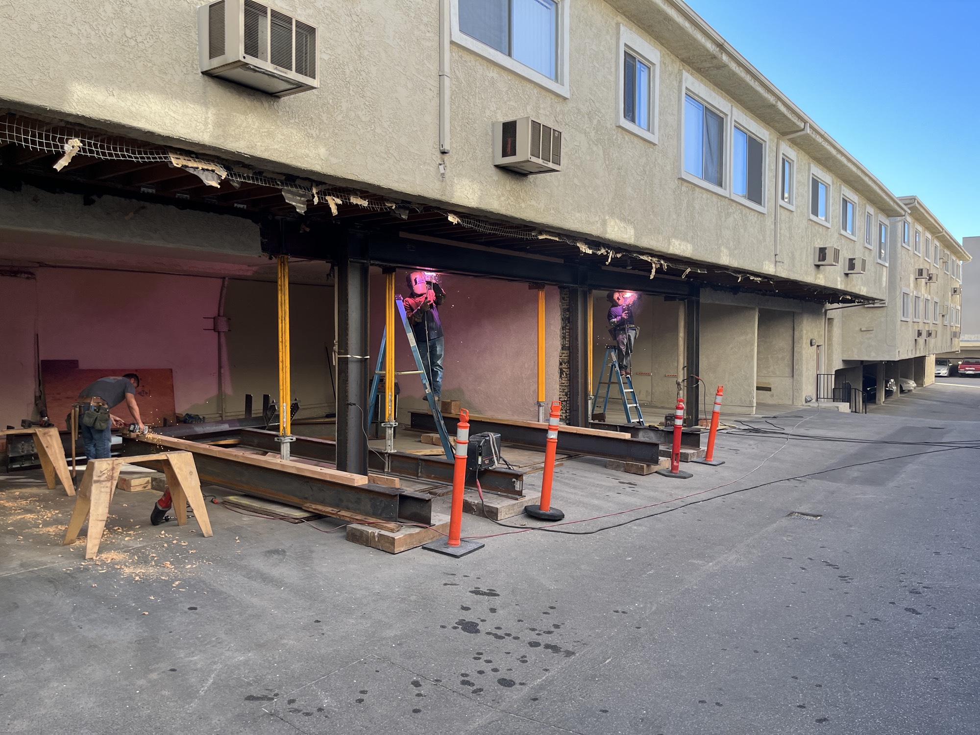 Soft-story seismic retrofit in progress