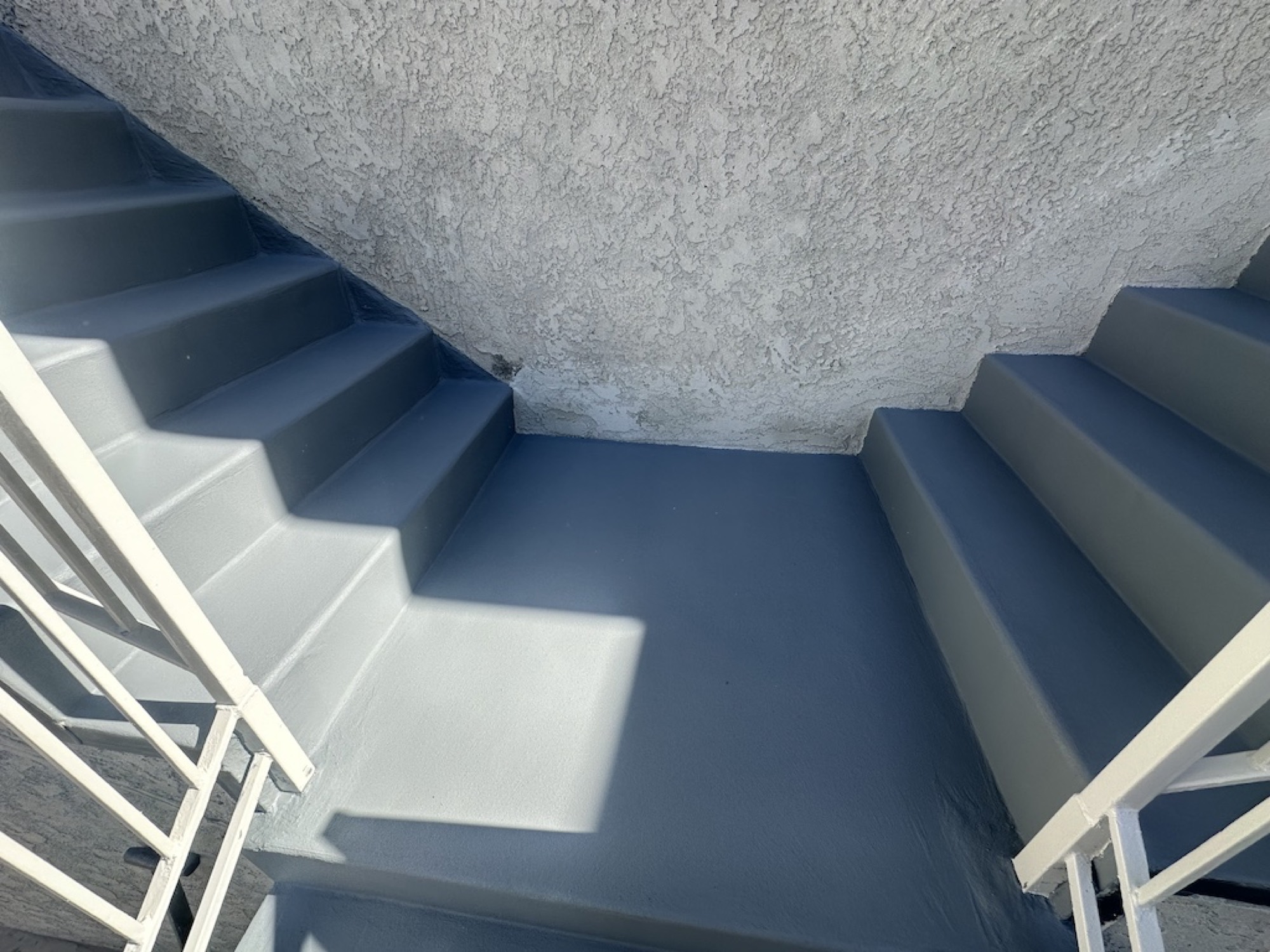 Exterior stairway with a fresh waterproofing coating
