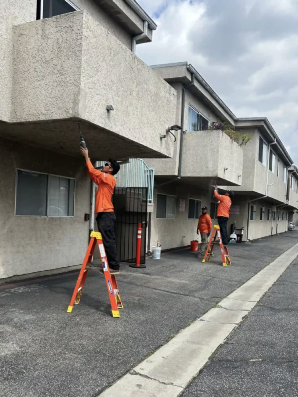 PAR Construction crew inspecting apartment balconies