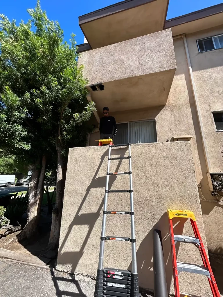 PAR Team Member conducting DT on a balcony